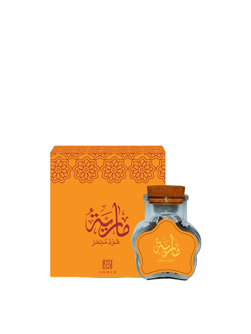 Maria Oud Mubakhar with a decorative box, featuring a orange and maroon/yellow design on both the oud container and the box. | www.almukarramah.com